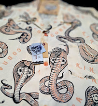 Load image into Gallery viewer, King Cobra snake print shirt by Vince Ray for Star of Hollywood - off white with black and orange print.