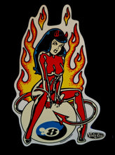 Load image into Gallery viewer, Sticker of a stylized character with flames and a pool ball, featuring the artist&#39;s signature.