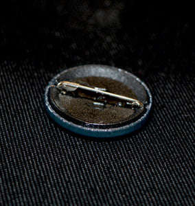 Panther head pin badge